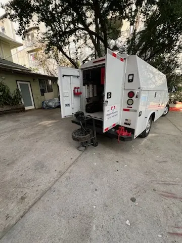 Magnet Plumbing service vehicle on-site for Water Heater Repair in Downtown Destin
